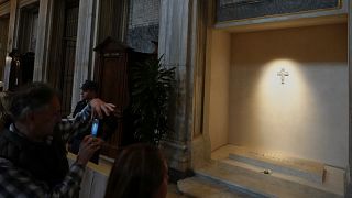 Visitors pay their respects at Pope Francis' tomb