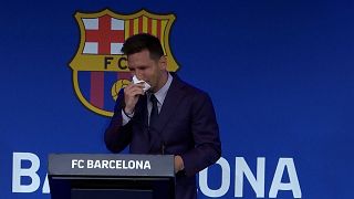 Lionel Messi fought back tears as he began a press conference