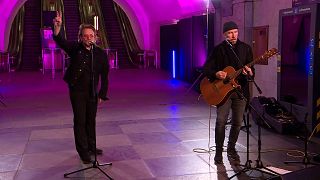  Bono of U2 gives a show in the metro of Kyiv